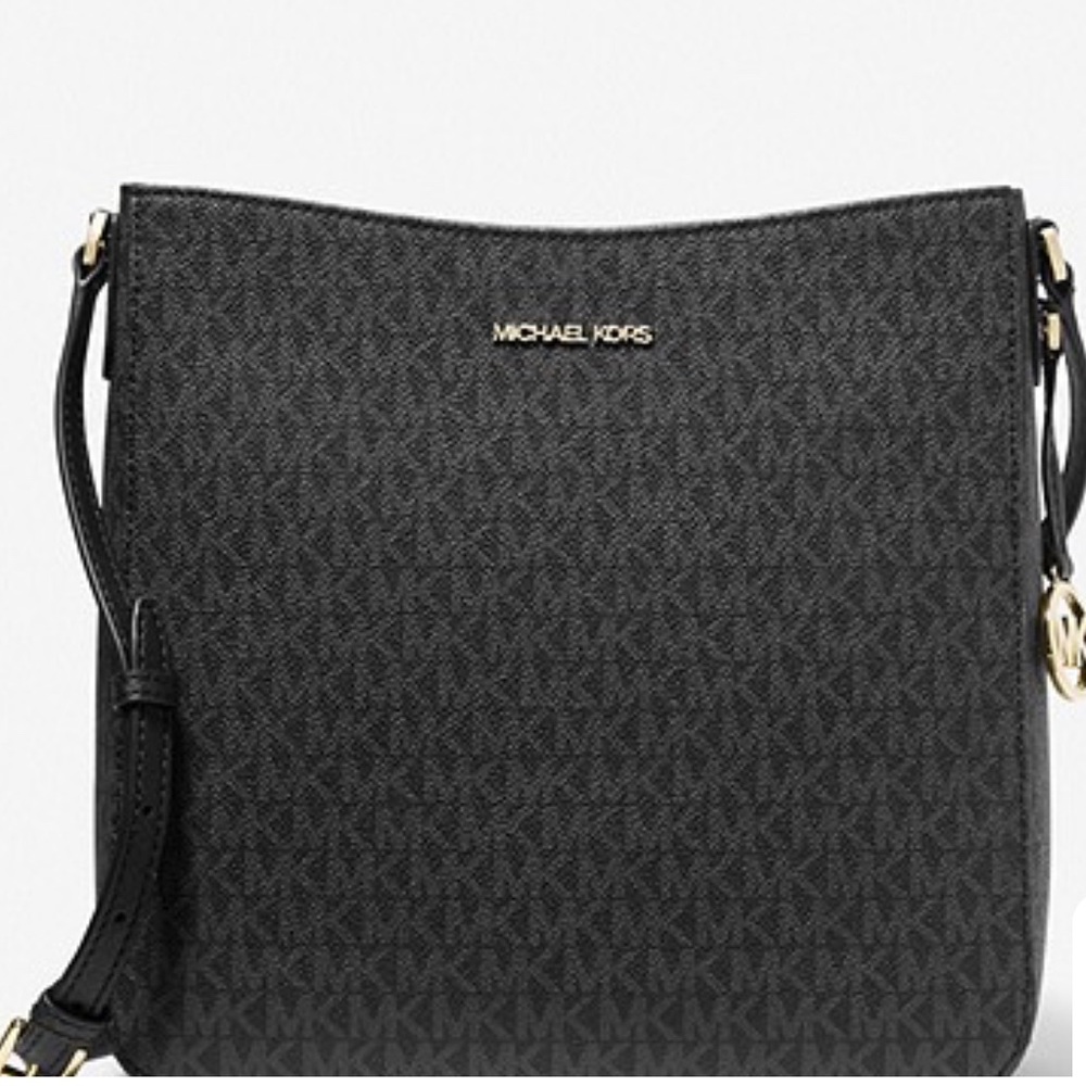 SOLD! MICHAEL MICHAEL KORS
Jet Set Travel Large Logo Messenger
Bag